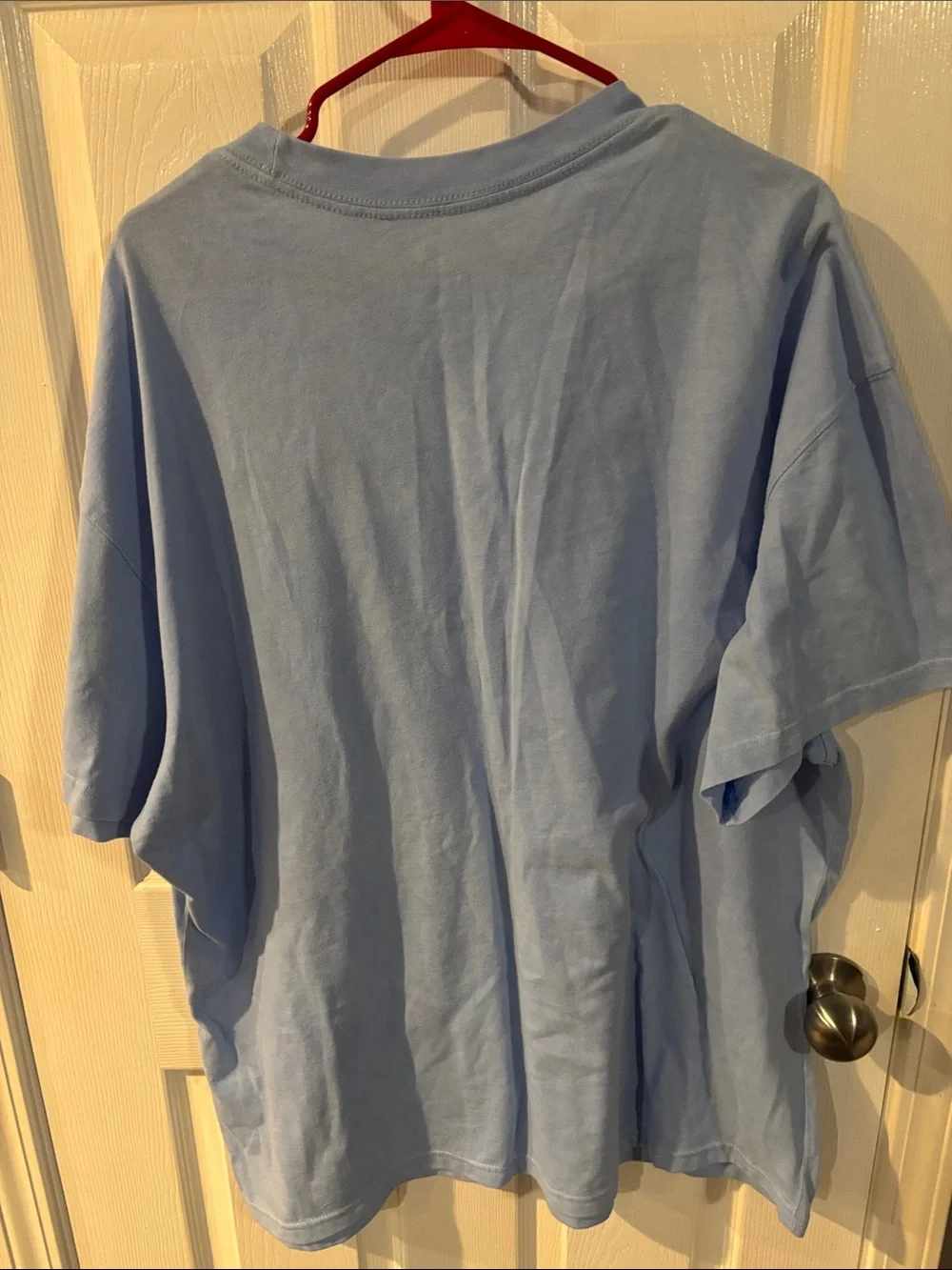 Nike Light Blue Tee with Pink, Yellow & Purple Graphic